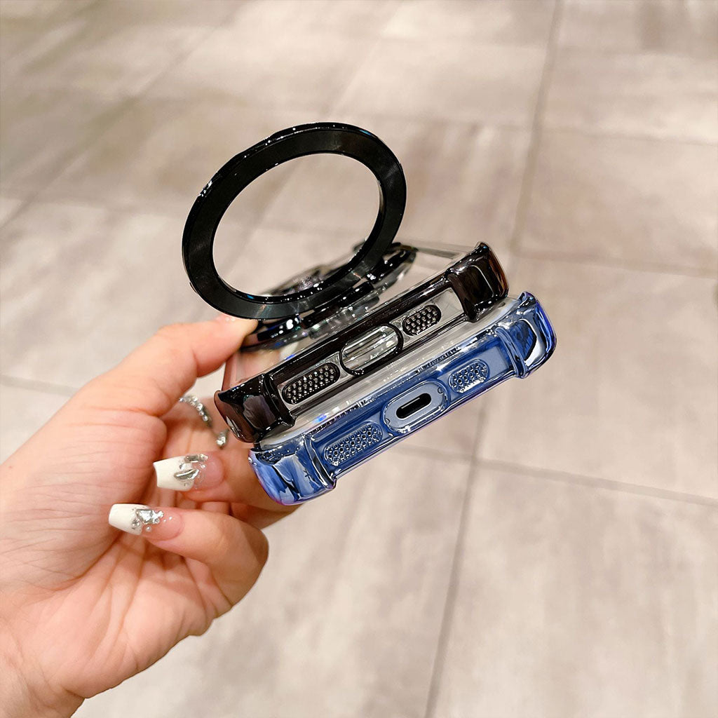 Phone case with reflective surface held by a hand against a neutral background
